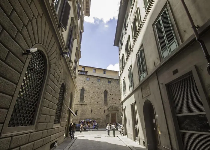 Beneath The Elegant Silhouette Of Duomo