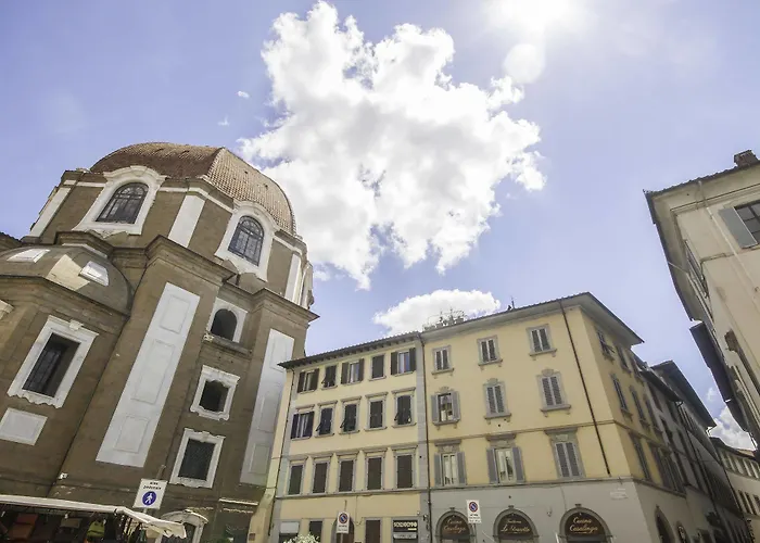 Beneath The Elegant Silhouette Of Duomo